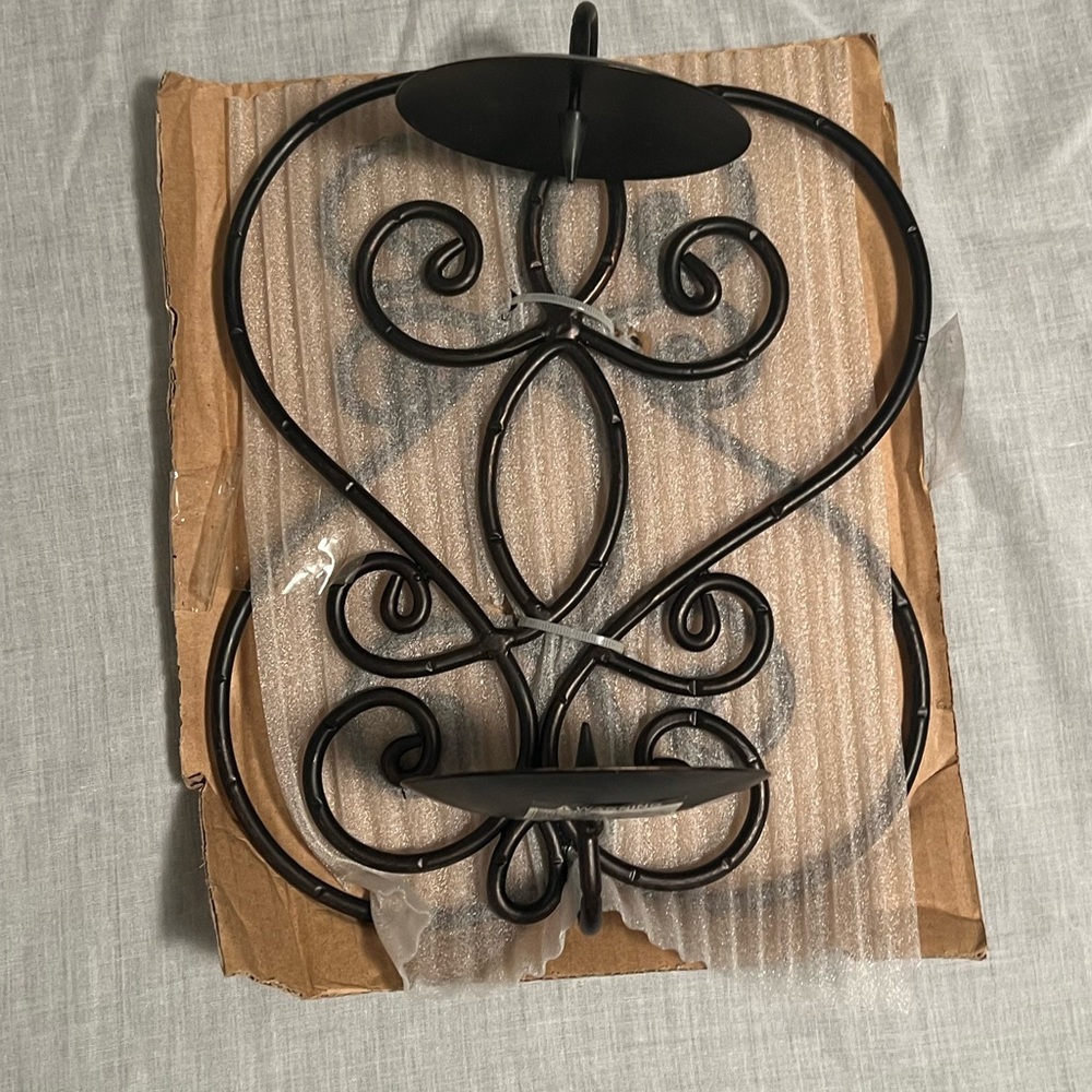 Set of wrought iron wall candle holders